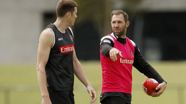 Travis Cloke gives Mason Cox a few pointers at Collingwood training. Picture: Getty Images