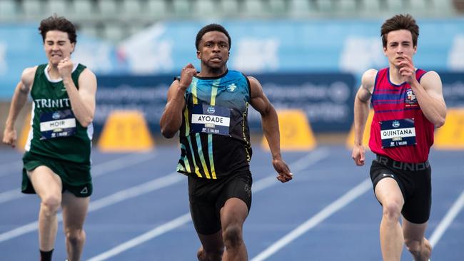 Joseph Ayoade from RSC winning the boys 200m 19 years final.
