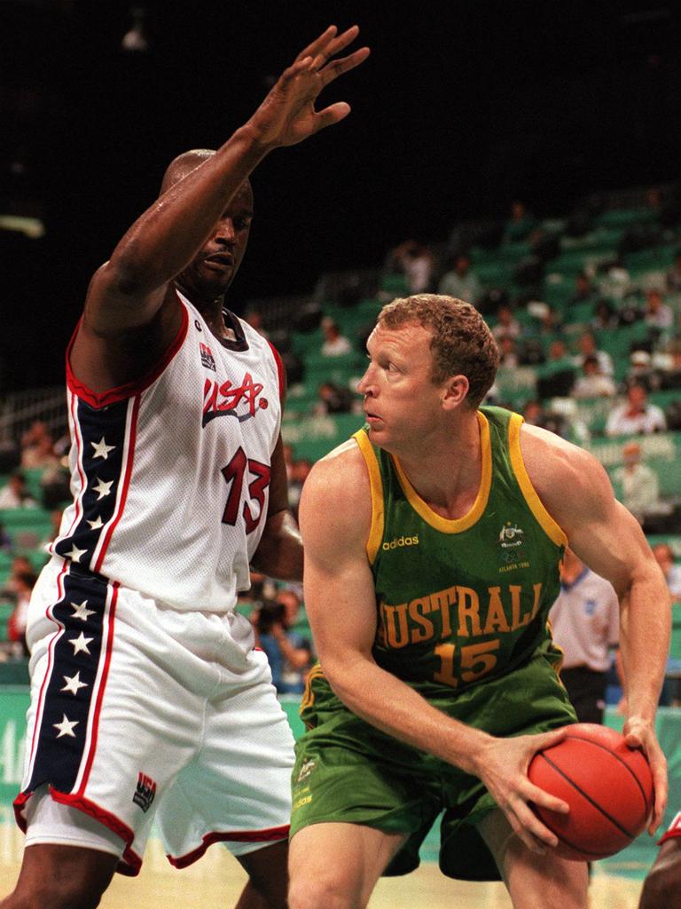 Shaquille O'Neal and Ray Borner tussle during the 1996 Olympics.