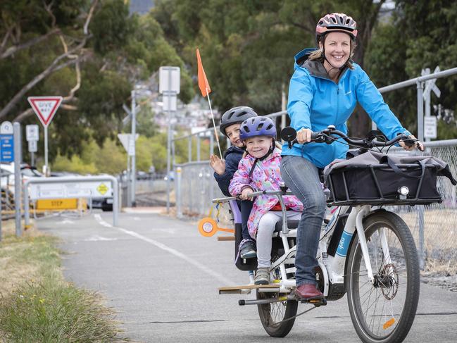 Gemma Kitsos with her children Hazel 7 and Bronte 5 of South Hobart on the Intercity Cycleway at Glenorchy. Picture: Chris Kidd