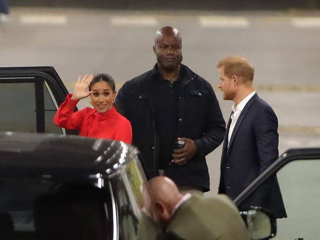 Pere Daobry watches over Prince Harry and Meghan Markle at London’s Euston Station after visiting Manchester on September 5 this year. Picture: Mega Agency