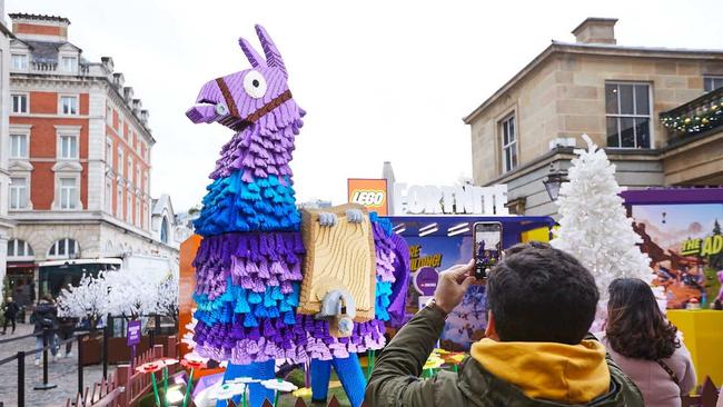 Colossal LEGO brick-built Supply Llamas have emerged in New York, London, Tokyo, and Sydney to promote the new game. Picture: Lego