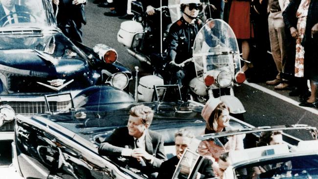 President John F Kennedy in the presidential limousine before his assassination. His wife Jacqueline is next to him and Texas Governor John Connally and his wife Nellie sit in front. (Photo by Universal History Archive/Universal Images Group via Getty Images)