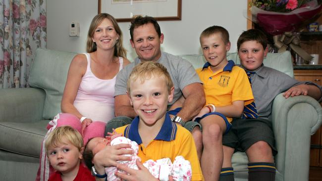 Big brother Jett, 9, holds his new baby sister Ava in 2005. The rest of the Walters clan are (from left) Harry (front in the red shirt) Narelle, Kevin, Billy and Jack.