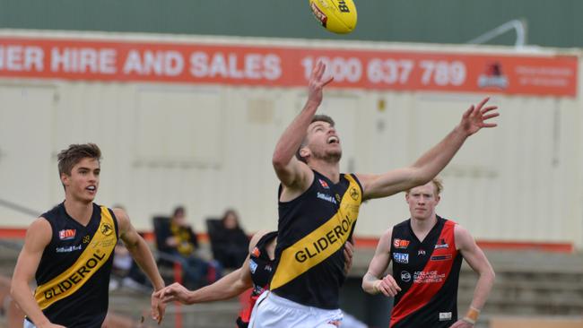 Glenelg captain Chris Curran ready to pounce on a loose ball. Picture: AAP Image/Brenton Edwards)