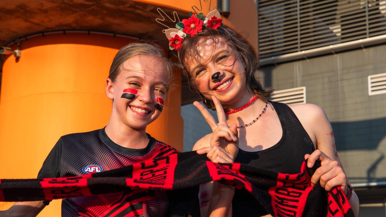 Flora Hackenberg and Marjorie Hackenberg as thousands of fans gathered for the AFLW Dreamtime game between Richmond and Essendon in Darwin. Picture: Pema Tamang Pakhrin