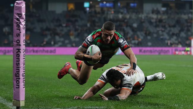 Souths winger Dane Gagai scores one of his three tries against Wests Tigers at Bankwest Stadium. Picture: Brett Costello