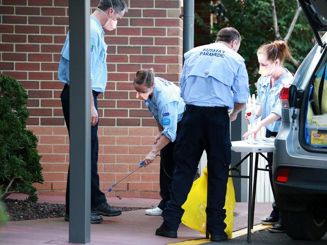 AUSMAT medical response team leave aged care facility Doutta Galla. Picture: Sarah Matray