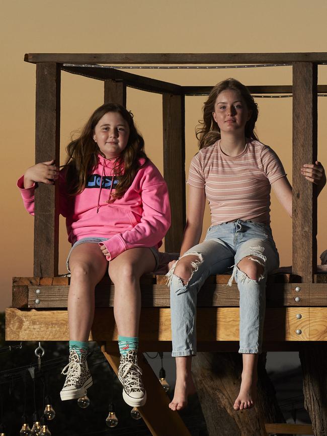 Delilah, 11, and Zenayah, 13, in the controversial treehouse. Picture: Matt Loxton