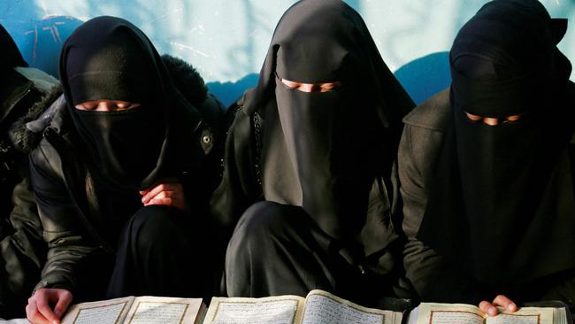 Afghan girls learn the holy Koran at a madrassa on the outskirts of Kabul. Picture: AFP