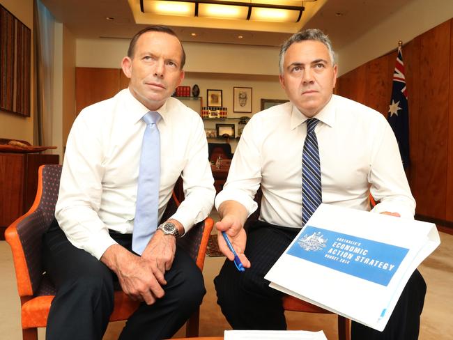 Tough love ... the Prime Minister Tony Abbott with the Treasurer Joe Hockey in the Prime Minister’s office chatting about the upcoming Budget for 2014. Picture: Gary Ramage