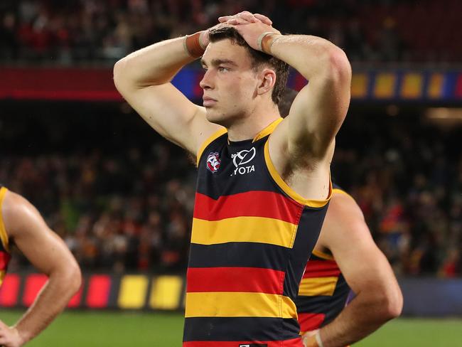 ADELAIDE, AUSTRALIA - AUGUST 19: Riley Thilthorpe of the Crows and Darcy Fogarty of the Crows after the loss during the 2023 AFL Round 23 match between the Adelaide Crows and the Sydney Swans at Adelaide Oval on August 19, 2023 in Adelaide, Australia. (Photo by Sarah Reed/AFL Photos via Getty Images)