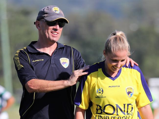 Former Gold Coast United coach Michael Cook with NPL Women's player Nadine Keast. Picture: Gold Coast United