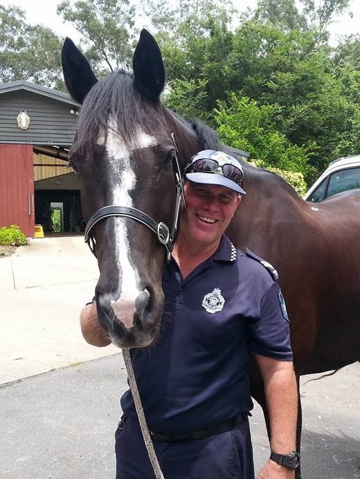 Slain police officer Senior Constable David (Dave) Masters with his beloved troop horse Manny at the QMPU in 2018. Pic supplied.