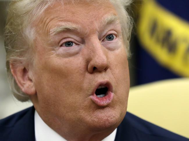 President Donald Trump speaks to the media after new White House Chief of Staff John Kelly was privately sworn in during a ceremony in the Oval Office on Monday. Picture: Evan Vucci/AP