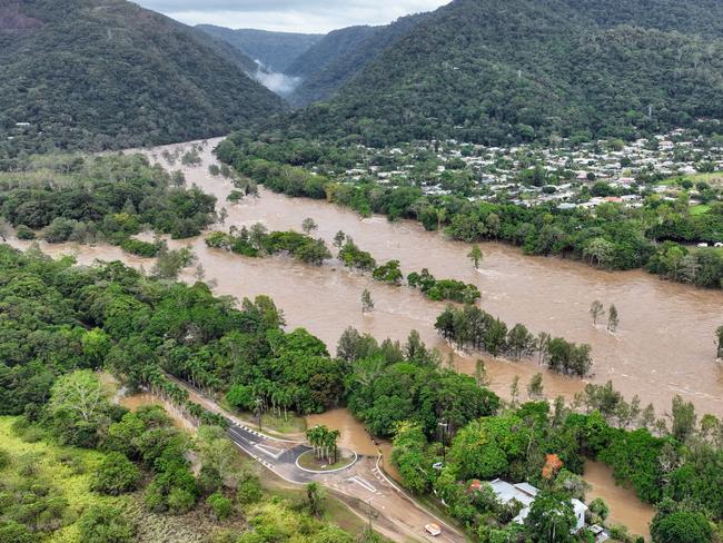 CAIRNS FLOOD BEFORE AND AFTER - The Barron River in Cairns, Far North Queensland, reached a record flood peak, with roads closed and homes flooded in the catchment area on Sunday, December 17. Flood waters lap at the Kamerunga bridge on the Western Road, and despite the bridge remaining open, road access was cut to the northern beaches of Cairns. The record flooding has been caused by ex Tropical Cyclone Jasper, which made landfall on December 13. Picture: Brendan Radke