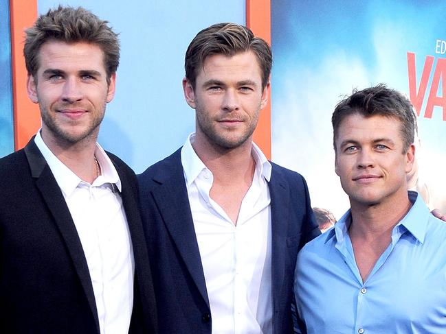 WESTWOOD, CA - JULY 27:  (L-R) Actors/brothers Liam Hemsworth, Chris Hemsworth and Luke Hemsworth arrive at the Premiere Of Warner Bros. 'Vacation' at Regency Village Theatre on July 27, 2015 in Westwood, California.  (Photo by Barry King/Getty Images)