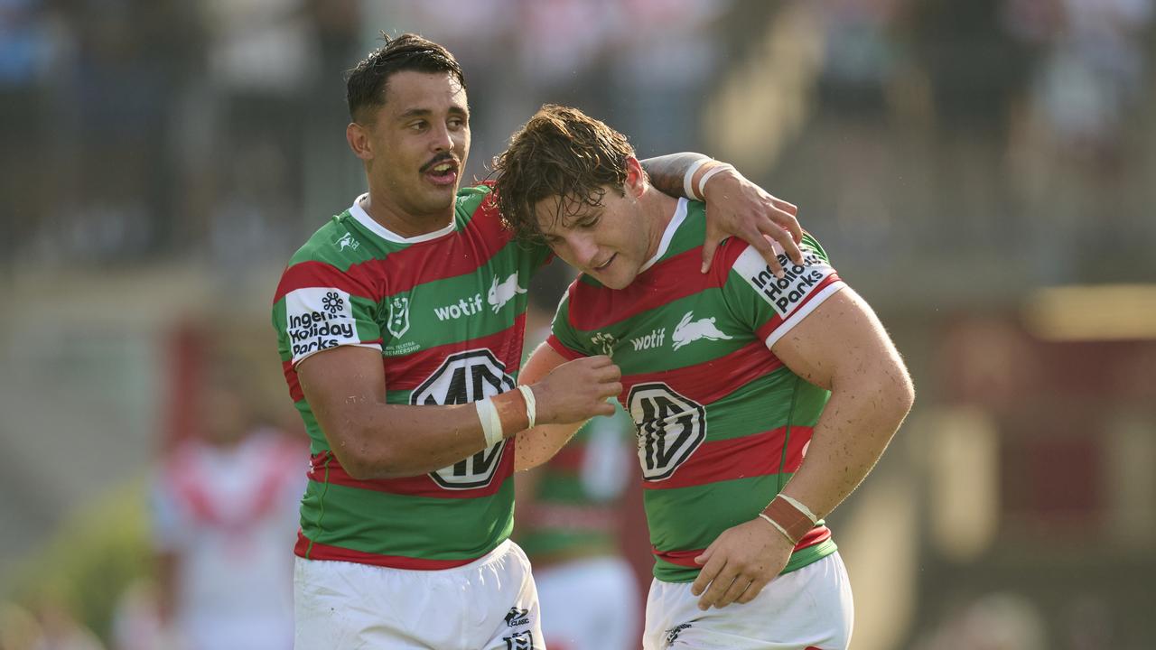 Jamie Humphreys (right) of the Rabbitohs celebrates victory with Jayden Sullivan (left). (Photo by Brett Hemmings/Getty Images)