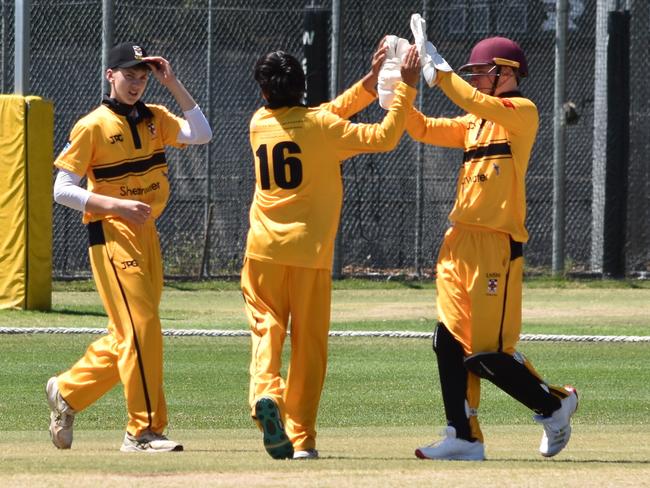 Nirav Sharma celebrates with keeper Fletcher Gersbach after bowling Mosman’s Hugh Taylor. Picture: Sean Teuma