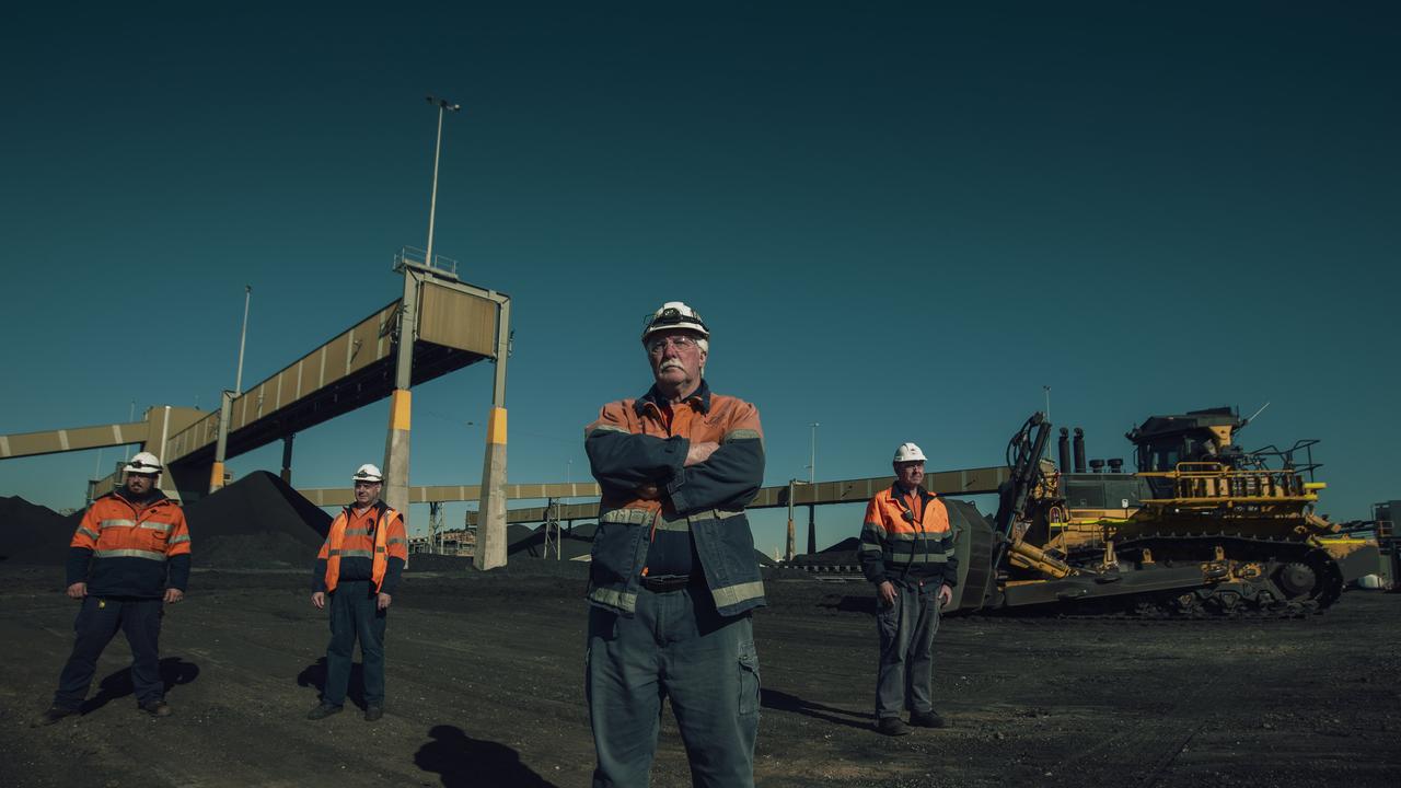 New Hope Coal employees at the Port of Brisbane, L-R, Robby Sharp, Brent Stewart, Harry Redmond and Dale Sharp. Picture: Glenn Hunt