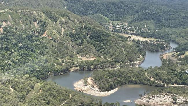 The landscape around the Bloomfield River at Degarra is irrevocably changed following the floods. The home of missing man Ray Dark, 85, is on the bend in the middle that has been laid bare by the ferocious water. Picture: Bronwyn Farr