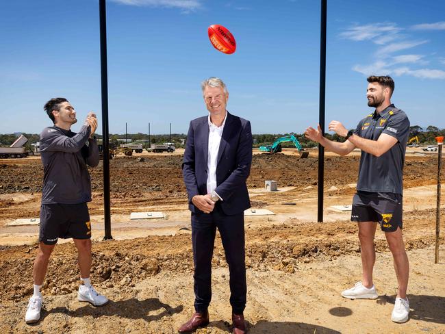 MELBOURNE, DECEMBER 6, 2023: President of the Hawthorn Football Club Andy Gowers inspects the progress at Hawthorn's future club site in Dingley with players Chad Wingard and Conor Nash. New oval in the background Picture: Mark Stewart