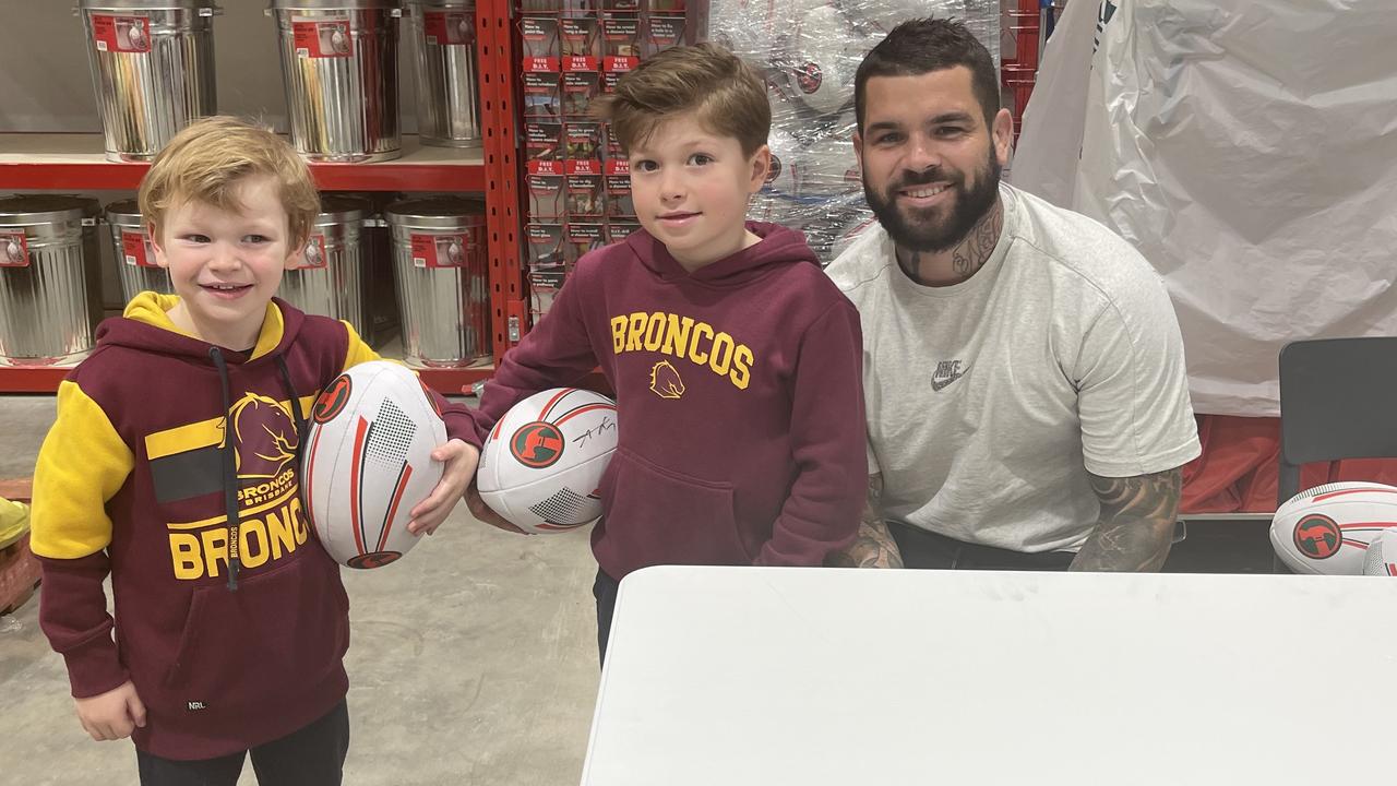 Adam Reynolds has still been giving back to the community while injured, meeting Broncos fans Hugo, 5, and Harry, 6.