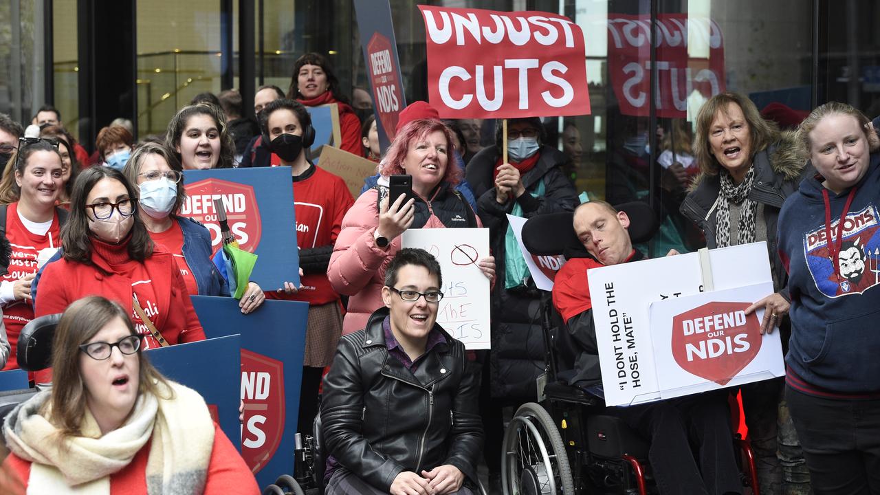 People with disability rally in Melbourne to object to the Morrison Government spending millions of dollars on lawyers to stop them accessing the NDIS. Picture: Andrew Henshaw