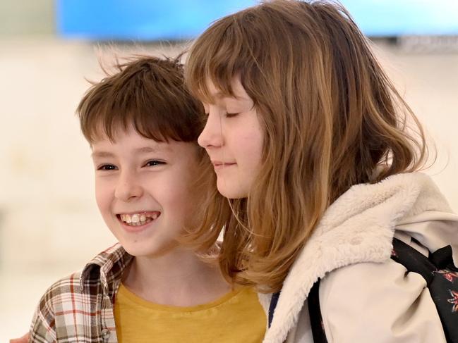 SYDNEY, AUSTRALIA -TelegraphMarch 22, 2022: 12-year-old Anastasiia Bablinyuk is reunited with her 9-year-old brother Kyrylo after they were separated whilst fleeing the Ukraine.  Picture:  Jeremy Piper