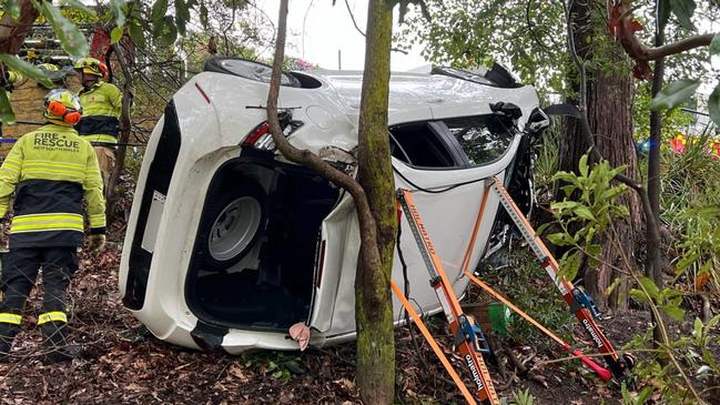 Fire and Rescue NSW worked for an hour to free the man trapped in his vehicle. Picture: Fire and Rescue NSW