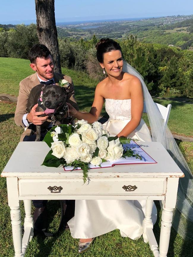 Doggie delights: Kelly Gaffney and Brendan Scheiwe and blue staffy Indie, photography: Quince and Mulberry Studios