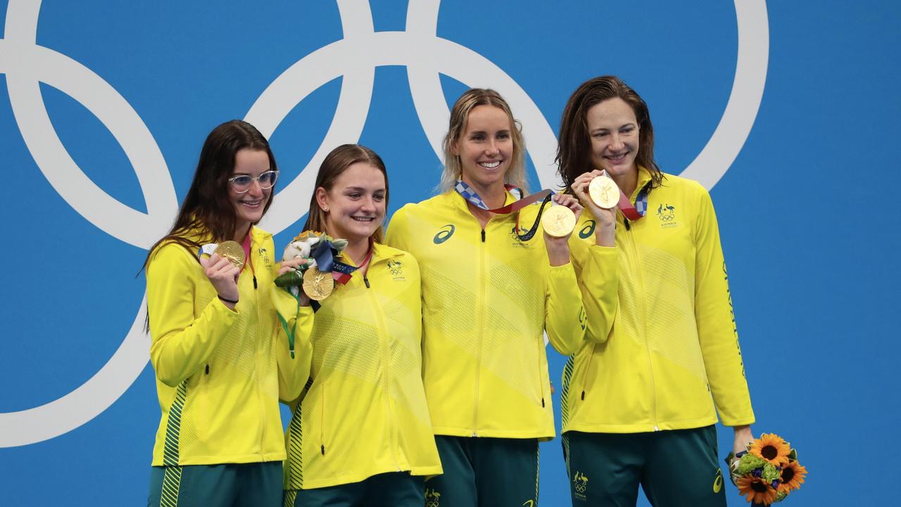 Gold medalist Kaylee McKeown, Chelsea Hodges Emma McKeon and Cate Campbell celebrate gold in the Women's 4 x 100m Medley Relay Final in Tokyo. Photo by Xavier Laine/Getty Images.