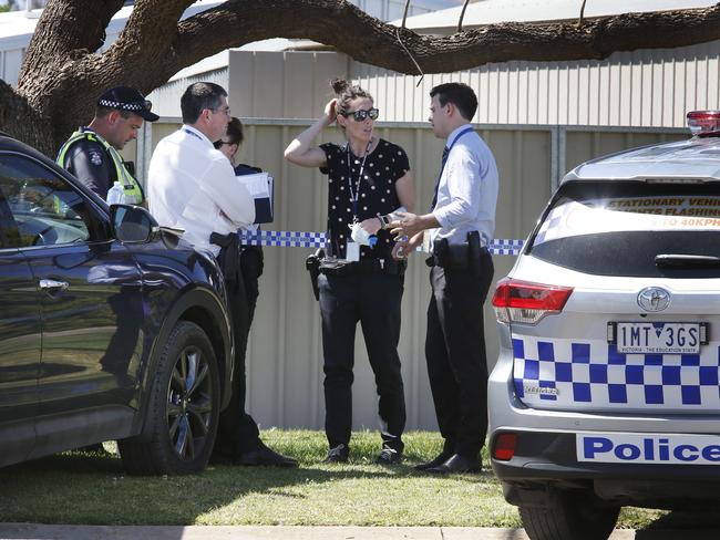 Homicide detectives outside the Red Cliffs home where a grandmother was allegedly shot dead by her son. Picture: David Caird