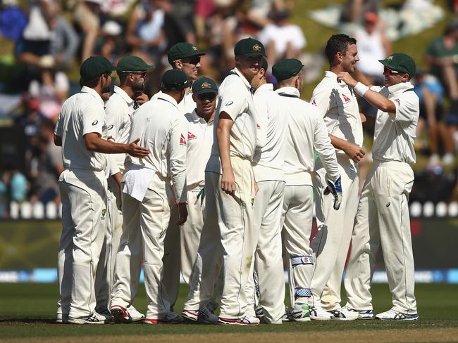 WELLINGTON, NEW ZEALAND - FEBRUARY 14: Josh Hazlewood and Peter Siddle of Australia celebrates after Hazlewood claimed the wicket of Kane Williamson of New Zealand during day three of the Test match between New Zealand and Australia at Basin Reserve on February 14, 2016 in Wellington, New Zealand. (Photo by Ryan Pierse/Getty Images)