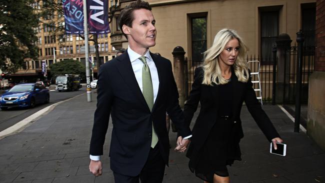 Oliver Curtis and his wife Roxy Jacenko arrive at court yesterday. Picture: Adam Yip