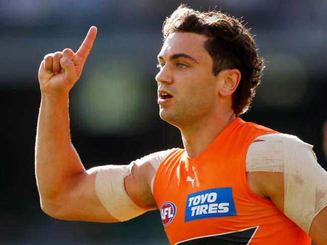 MELBOURNE, AUSTRALIA - MARCH 27: Tim Taranto of the Giants celebrates a goal during the 2022 AFL Round 02 match between the Richmond Tigers and the GWS Giants at the Melbourne Cricket Ground on March 27, 2022 In Melbourne, Australia. (Photo by Dylan BurnsAFL Photos)