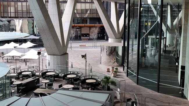 An empty cafe at Grosvenor Place in Sydney’s CBD. Picture: Toby Zerna