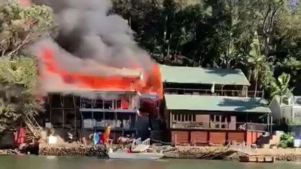 The fire which destroyed a home in Berowra Waters. Picture: Peter Galloway