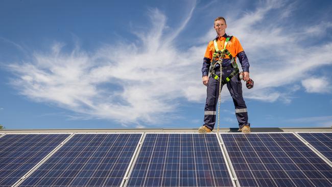 Origin Energy solar installation field supervisor Jack Smyth and his wife Melanie and kids Oliver, 14, Max, 12 and Hunter, 10.Jack works in solar and has a solar system on his house in Benalla. Picture: Jason Edwards