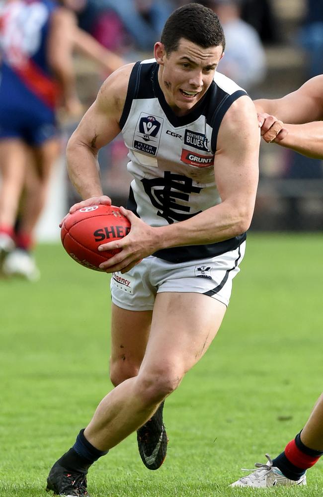 Tom Wilson charges away from a contest for Northern Blues.