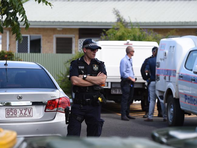 Police at the scene of the murder at a unit at 146 Cambridge St, Granville.