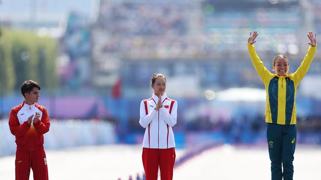 PARIS, FRANCE - AUGUST 01: Gold medalist Jiayu Yang of Team People's Republic of China (C), Silver medalist Maria Perez of Team Spain (L) and Bronze medalist Jemima Montag of Team Australia (R) pose on the podium after the Women's 20km Race Walk on day six of the Olympic Games Paris 2024 at Trocadero on August 01, 2024 in Paris, France. (Photo by Luke Hales/Getty Images)