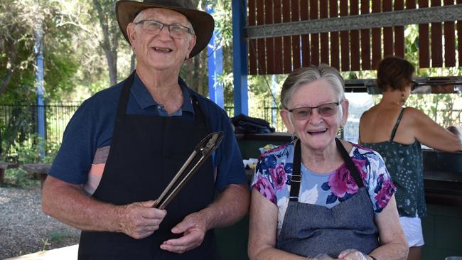 John and Maureen Hall serving sausage sizzle at the Australia Day event at Glenwood.