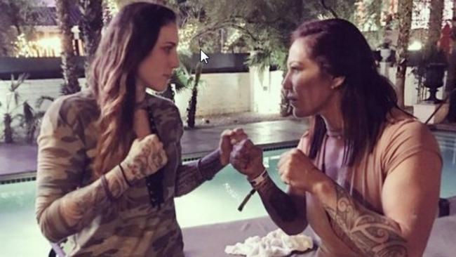 Megan Anderson shapes up to Cyborg.