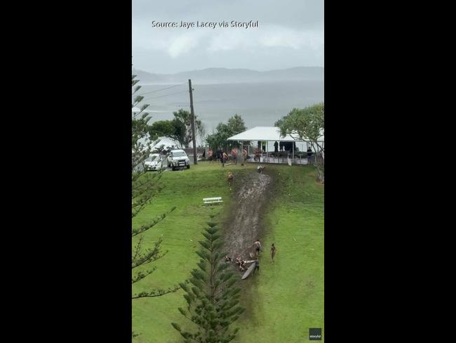 Aussie Kids Turn Hill Into Muddy Slide as Tropical Cyclone Alfred Nears