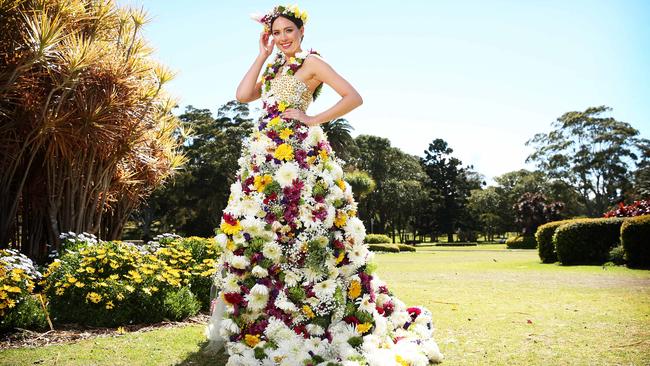 Pageant Queen and former Miss World Australia, Madeline Cowe, wearing a dress made from 1200 flowers. Picture: Tim Hunter