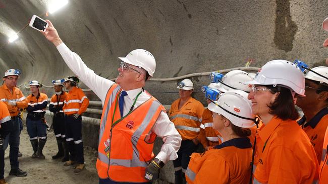 Prime Minister Malcolm Turnbull takes a selfie with NSW Premier Gladys Berejiklian during the first tunnel breakthrough of the NorthConnex project.