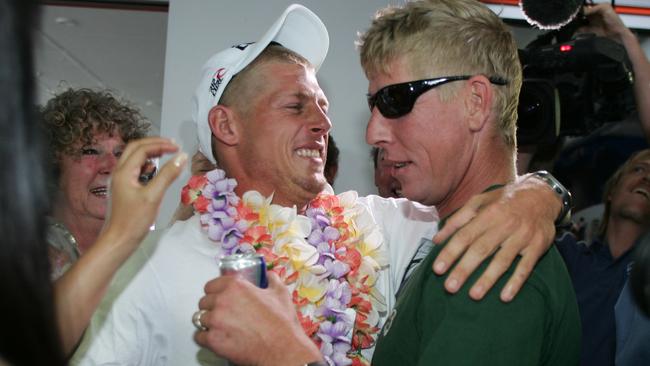 Mick and Edward celebrate a world championship win.