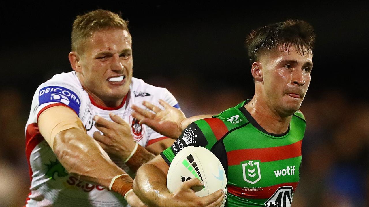 Lachlan Ilias is tackled by George Burgess. (Photo by Mark Metcalfe/Getty Images)