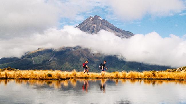 Hikers at Mount Taranaki in New Zealand.